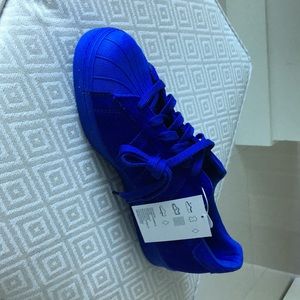 New, never worn superstar purple adidas.